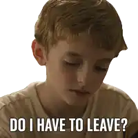 a boy with a sticker that says do i have to leave