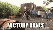Victory Dance Chimpanzee GIF - Victory Dance Chimpanzee Gun GIFs