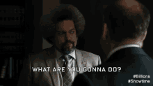 a man in a suit and tie is talking to another man and says what are you gonna do ..