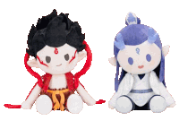 two stuffed dolls are sitting next to each other and one has the number 6 on its head