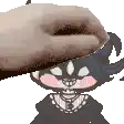a person is petting a cartoon character 's head with a hand .