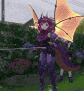 a girl with a dragon costume is holding a sword in a garden