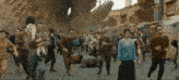 a group of people running down a street with a sign that says ' a '