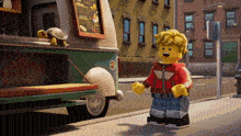 a lego character is standing in front of a food truck with a menu on it