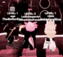 a couple of people standing next to each other on a stage .