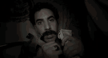 Barely See Her Horns - Borat GIF - Borat Sacha Baron Cohen Horns GIFs