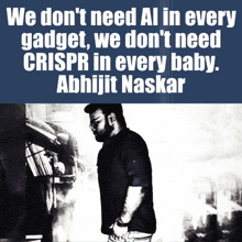 a man is standing in front of a sign that says we don t need al in every gadget