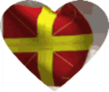 a red heart with a yellow ribbon on it