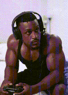 a pixelated image of a man wearing headphones and holding a game controller
