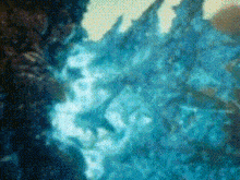 a close up of a painting of a monster with a blue background