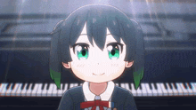 a girl with green eyes is smiling in front of a piano keyboard