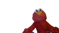 elmo from sesame street holding a rock in his hand
