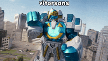 a robot is standing in front of a city with vitorsans written above it