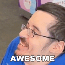 a man wearing glasses and a blue shirt with the word awesome written on his face