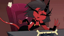 a cartoon character with horns is sitting at a table