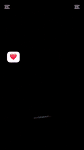 a phone screen shows a heart surrounded by pink hearts and the words capcut
