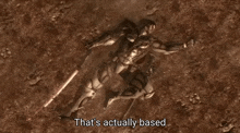 a video game character is laying on the ground with a sword in his hand .