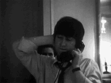 The Beatles John Lennon GIF - The Beatles John Lennon Phone Call GIFs