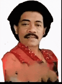 a man with a mustache is wearing a black hat and a red shirt