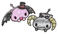 a pink devil and a black ram are sitting next to each other .