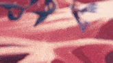 a close up of a person 's arm with a red background and a blurred image .