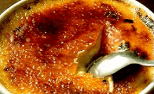 Cracking Creme Brulee With A Teaspoon GIF - Creme Brulee Amelie Dessert GIFs