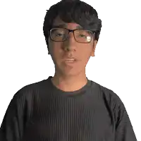 a man wearing glasses and a sebastian t-shirt