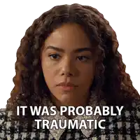a woman with curly hair has the words " it was probably traumatic " on her face