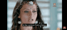 a close up of a woman 's face with the words to be a prince from a dasyu