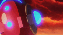 a red object with blue lights on it against a red sky
