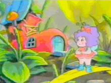 a fairy is standing in front of a pink house