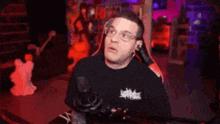 a man is laying down in a gaming chair with the number 30 on it
