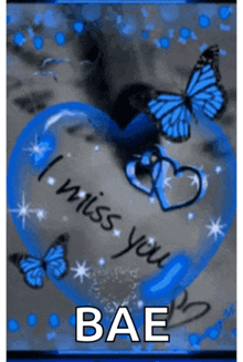 a blue heart that says i miss you bae