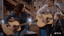 Playing Guitar Bailey GIF - Playing Guitar Bailey Country Comfort GIFs