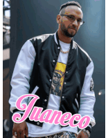 a man wearing glasses and a black and white jacket with the name juaneco on it