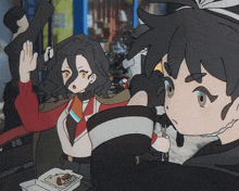a couple of anime characters standing next to each other with one holding a sandwich