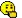 a pixel art illustration of a smiley face with a thumbs up .