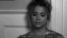 a black and white photo of a woman crying and saying i might seem strong but i break