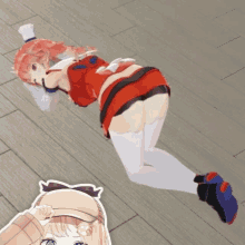 a girl in a red dress is laying on the floor next to another girl