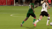a soccer player wearing a number 11 jersey kicks the ball