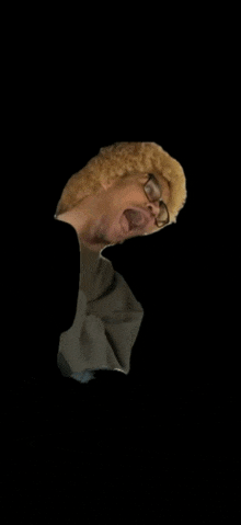 a man wearing glasses and a wig is yawning in a black background