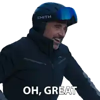 a man wearing a smith helmet and goggles is saying oh great