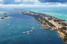 an aerial view of a body of water with a small island in the middle