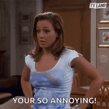 a woman says " your so annoying " in front of a tv land sign