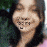 a blurry picture of a woman with the words " can you hold me down " above her