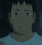 a person with a cigarette in their mouth