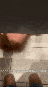 a person is pooping by themselves in a bathroom