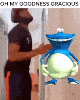 a man standing next to a frog that says oh my goodness gracious on it