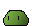 a pixel art illustration of a green frog with two eyes .