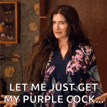 a woman in a robe is saying `` let me just get my purple cock . ''